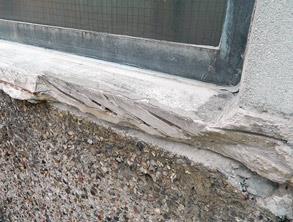 Heavily damaged concrete window sill Heavily damaged concrete window sill