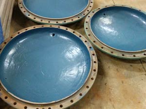 Pits filled and end covers coated with Belzona material Pits filled and end covers coated with Belzona material