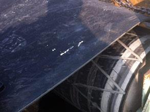 Worn rubber cladding causing belt slippage Worn rubber cladding causing belt slippage
