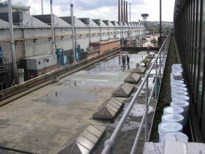 Leaking flat roof at steel manufacturing site Leaking flat roof at steel manufacturing site