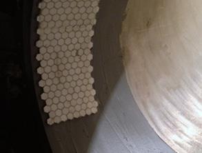 Alumina tiles bonded to the prepared surface Alumina tiles bonded to the prepared surface